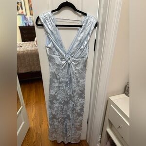 Light blue floral satin maxi dress with a tie in the front and slit in the side